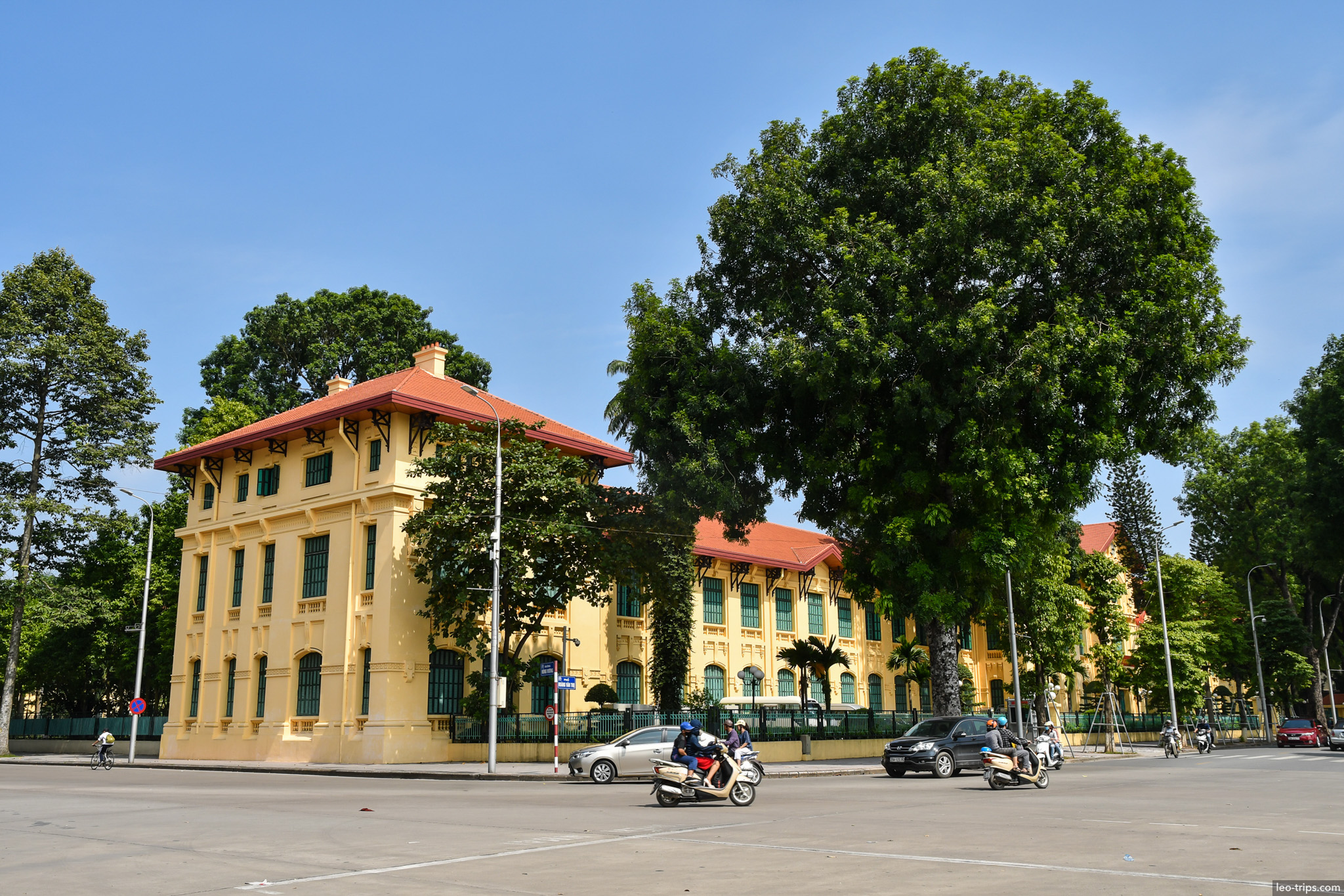 french colonial yellow building hanoi street hanoi