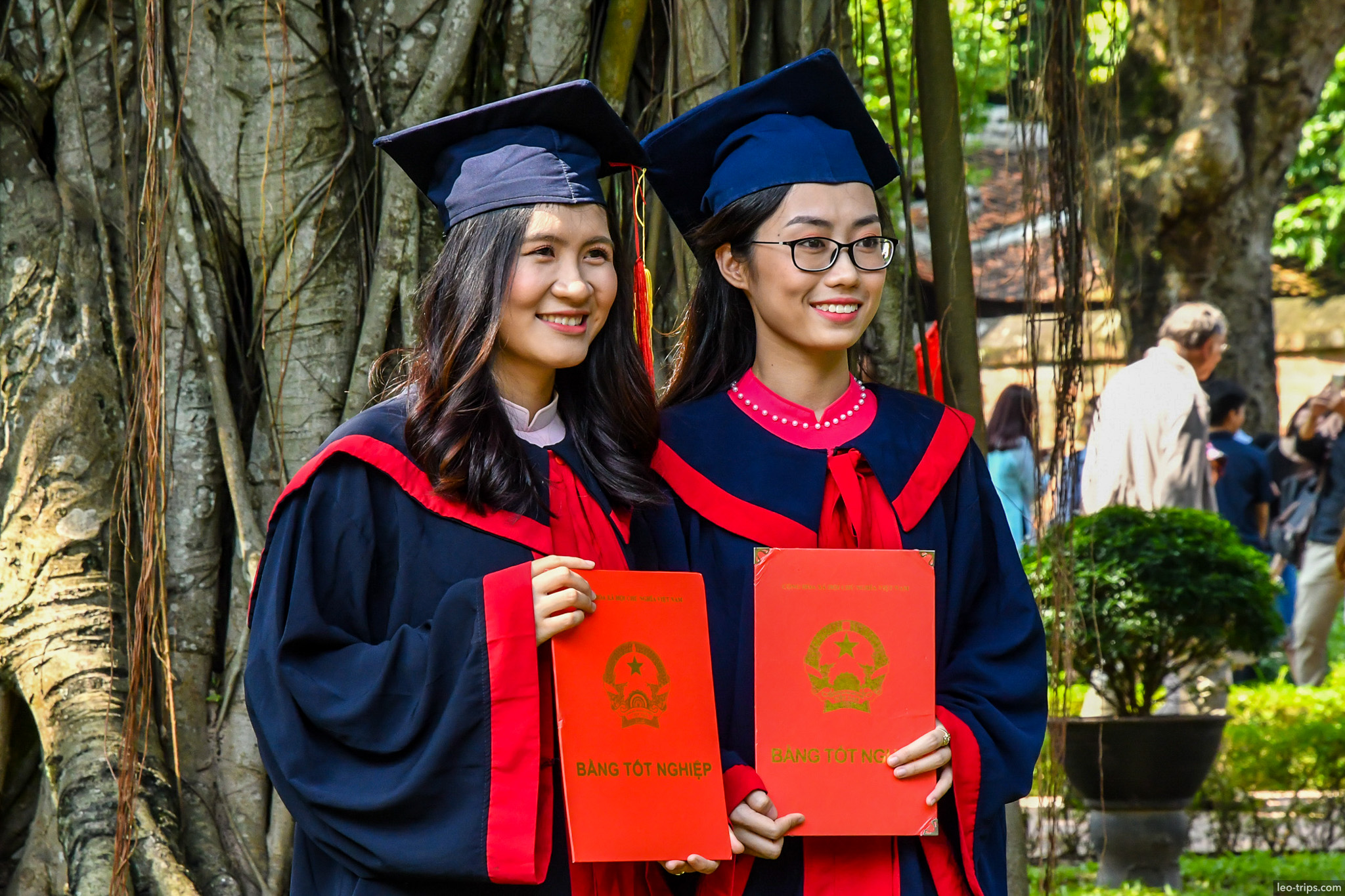 graduates in gowns holding diplomas temple of literature hanoi hanoi