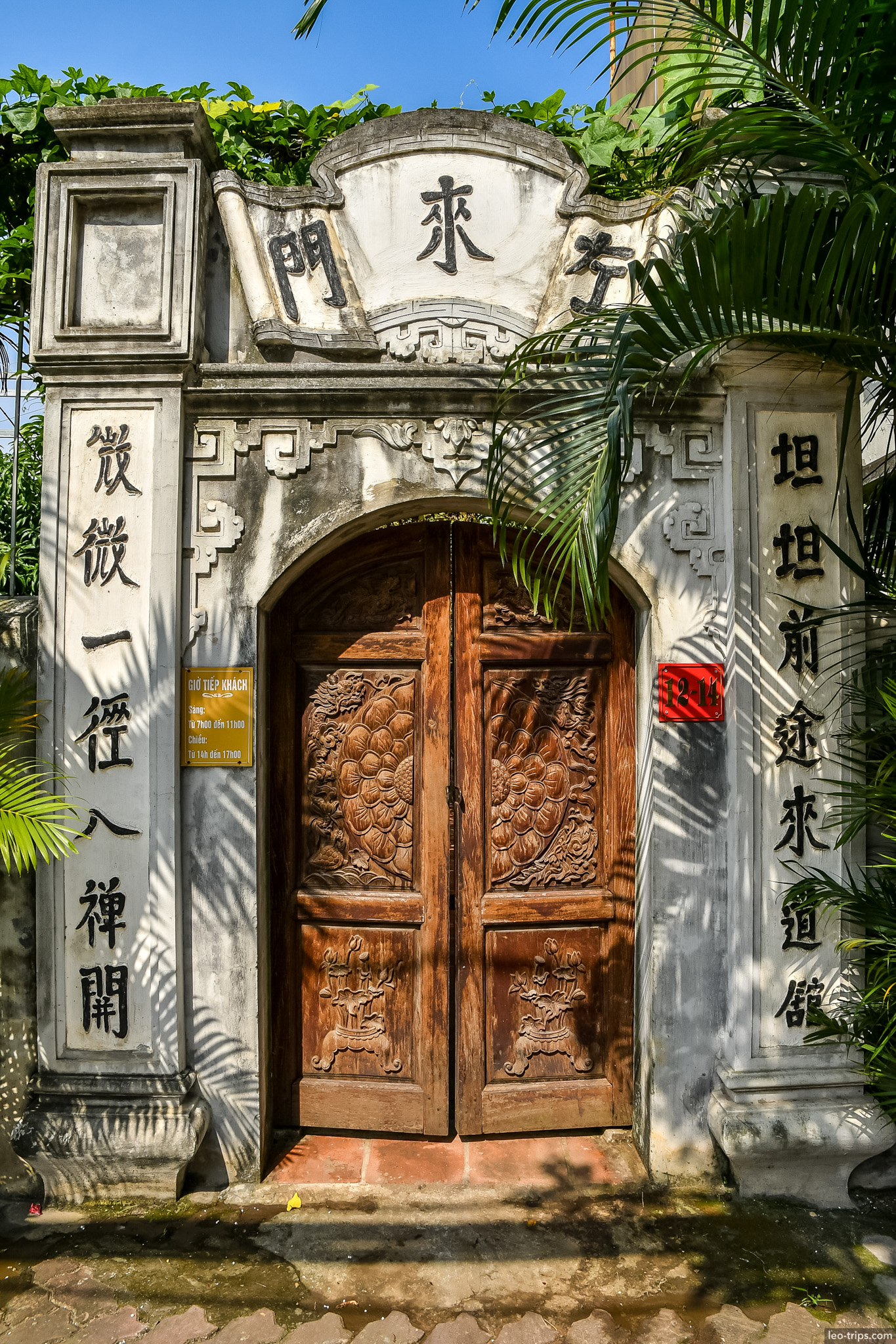 ornate carved wooden temple gate chinese inscriptions hanoi hanoi