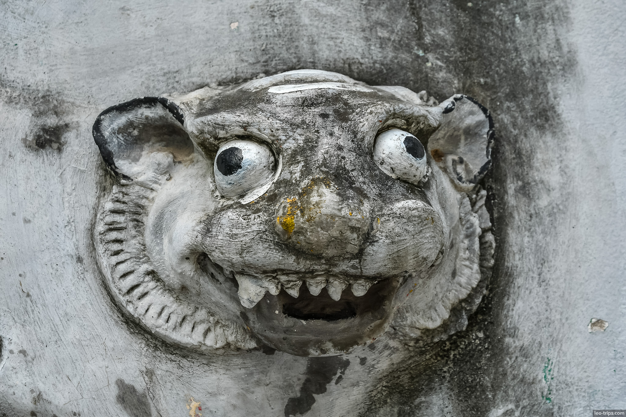 stone lion relief closeup vietnamese temple hanoi