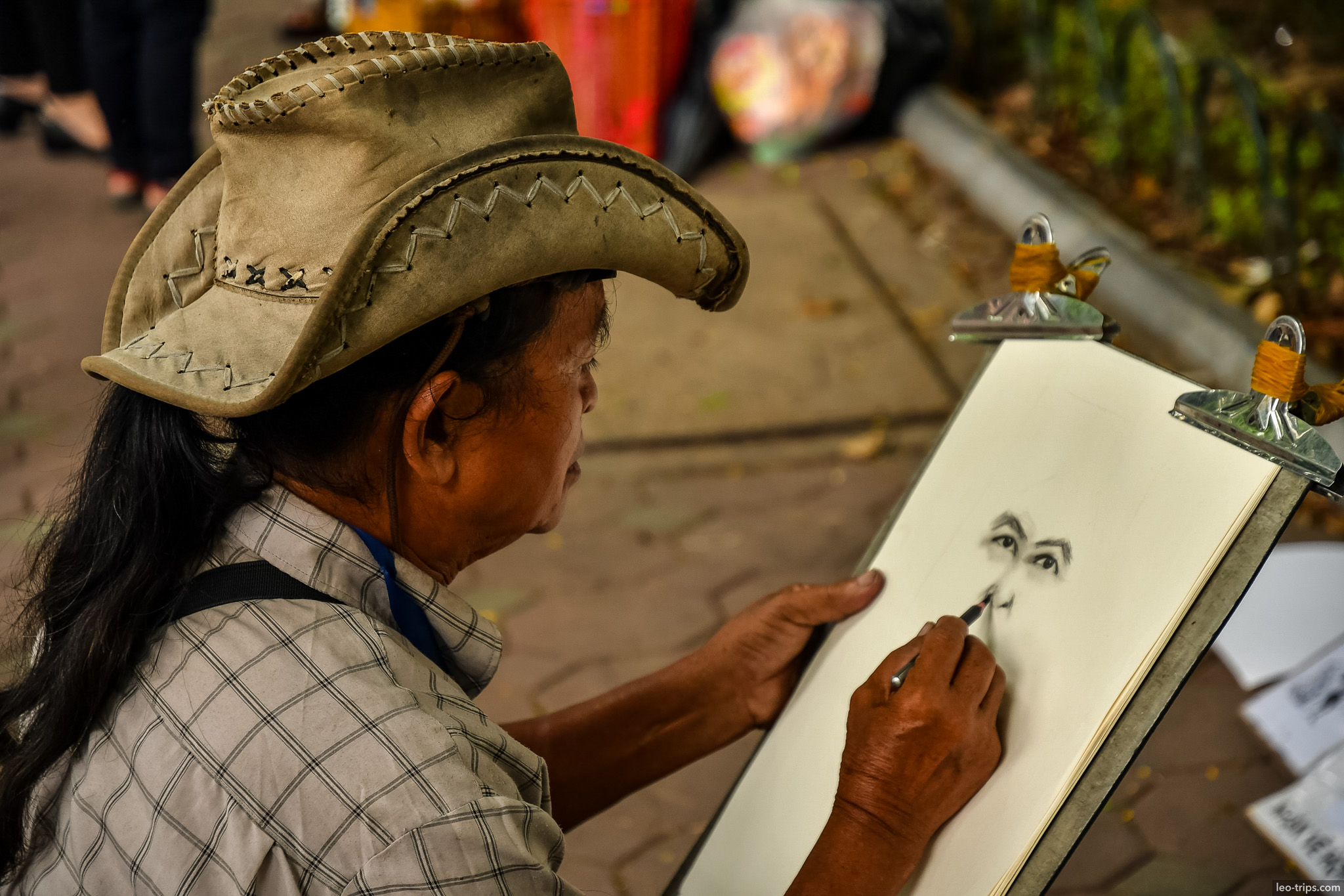 street artist drawing portrait sidewalk hanoi hanoi