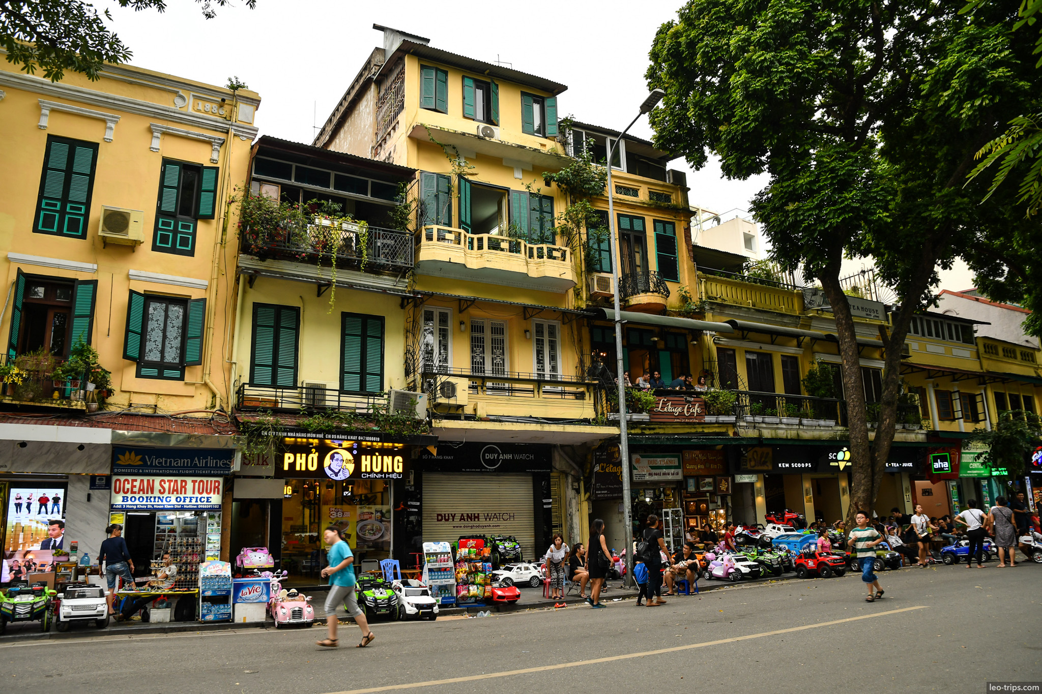yellow colonial buildings shops hoan kiem street hanoi hanoi