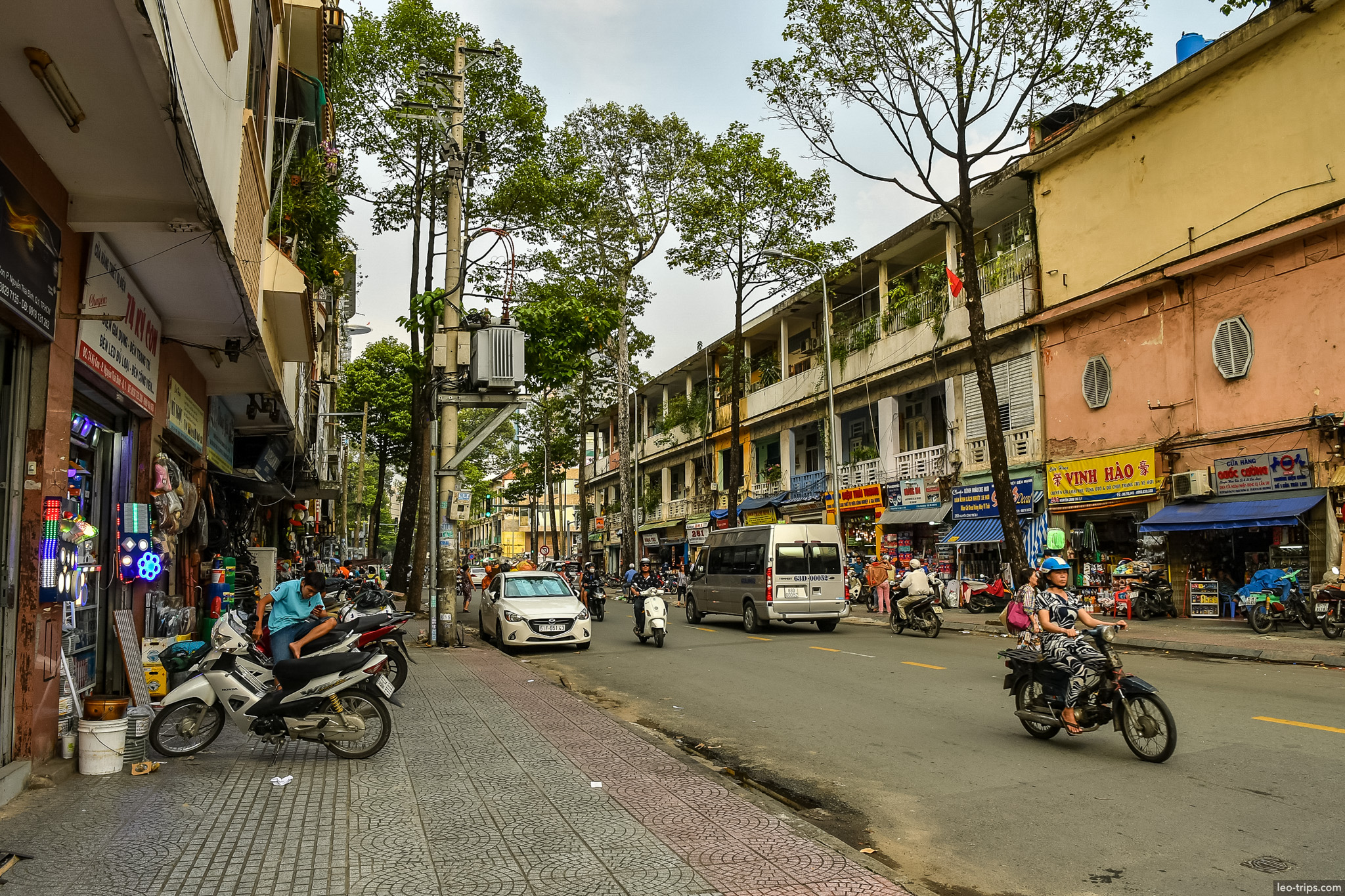 busy street old shophouses saigon district ho chi minh city