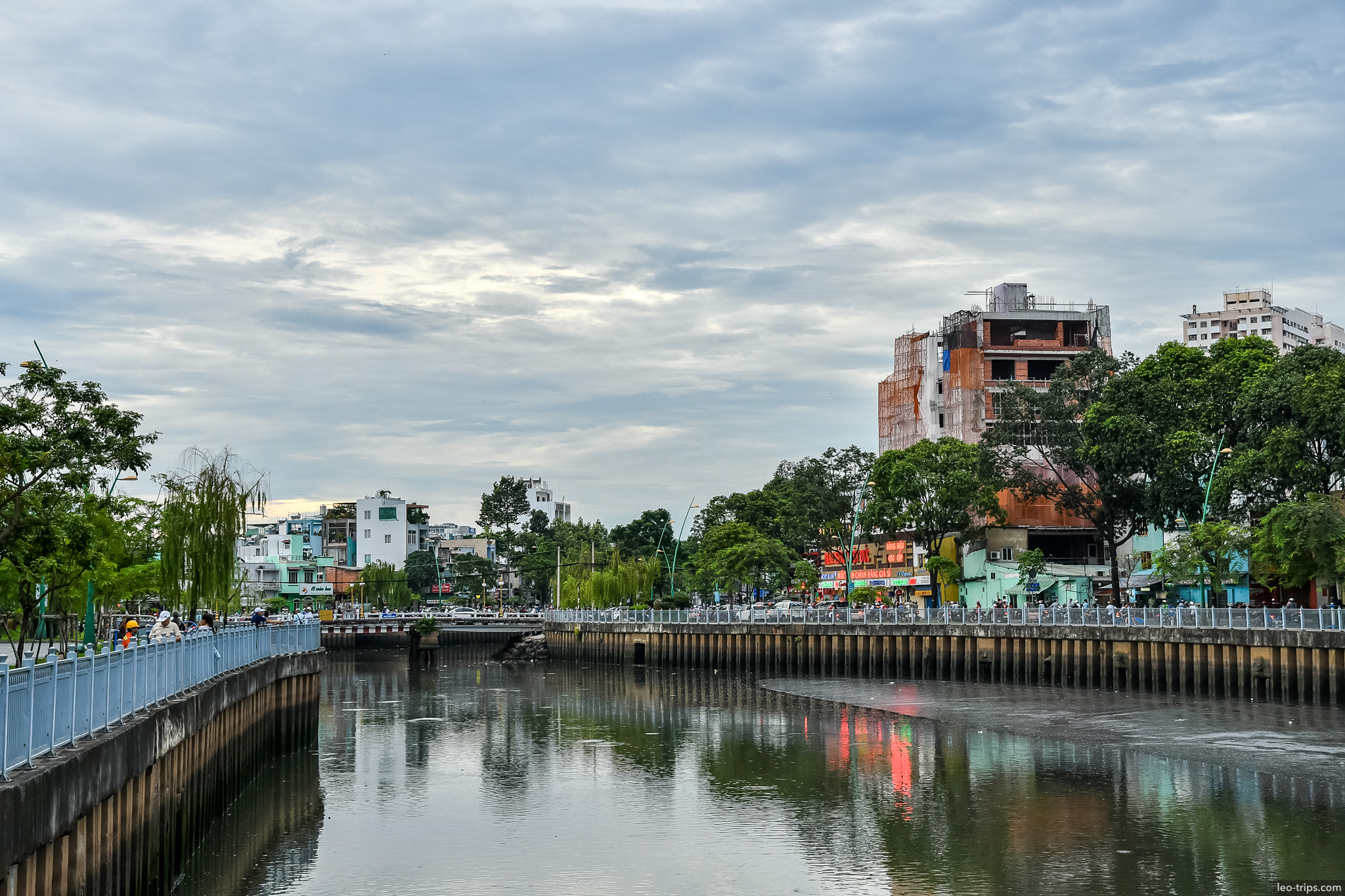 canal bridge evening reflection saigon ho chi minh city