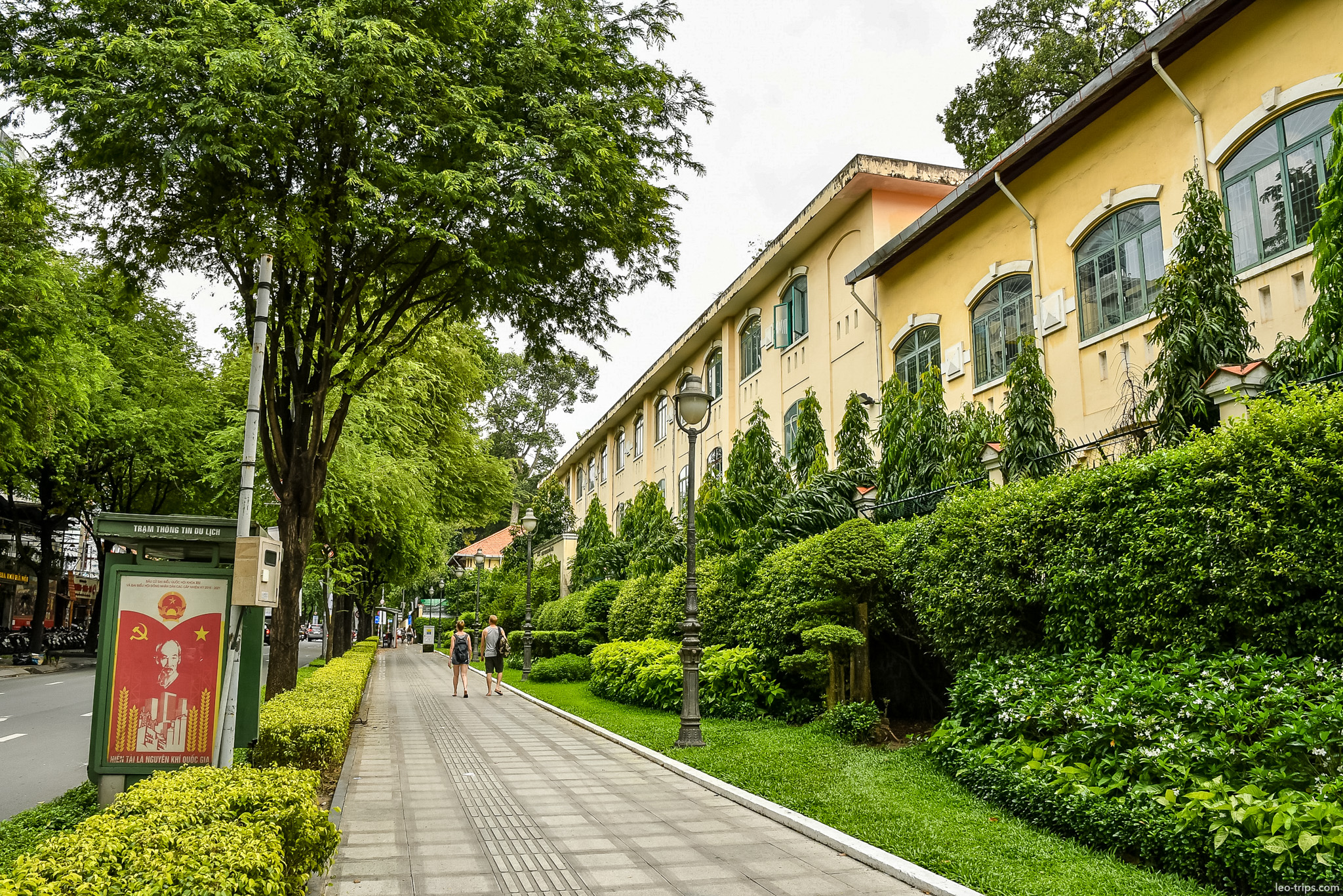 colonial yellow building propaganda poster saigon ho chi minh city