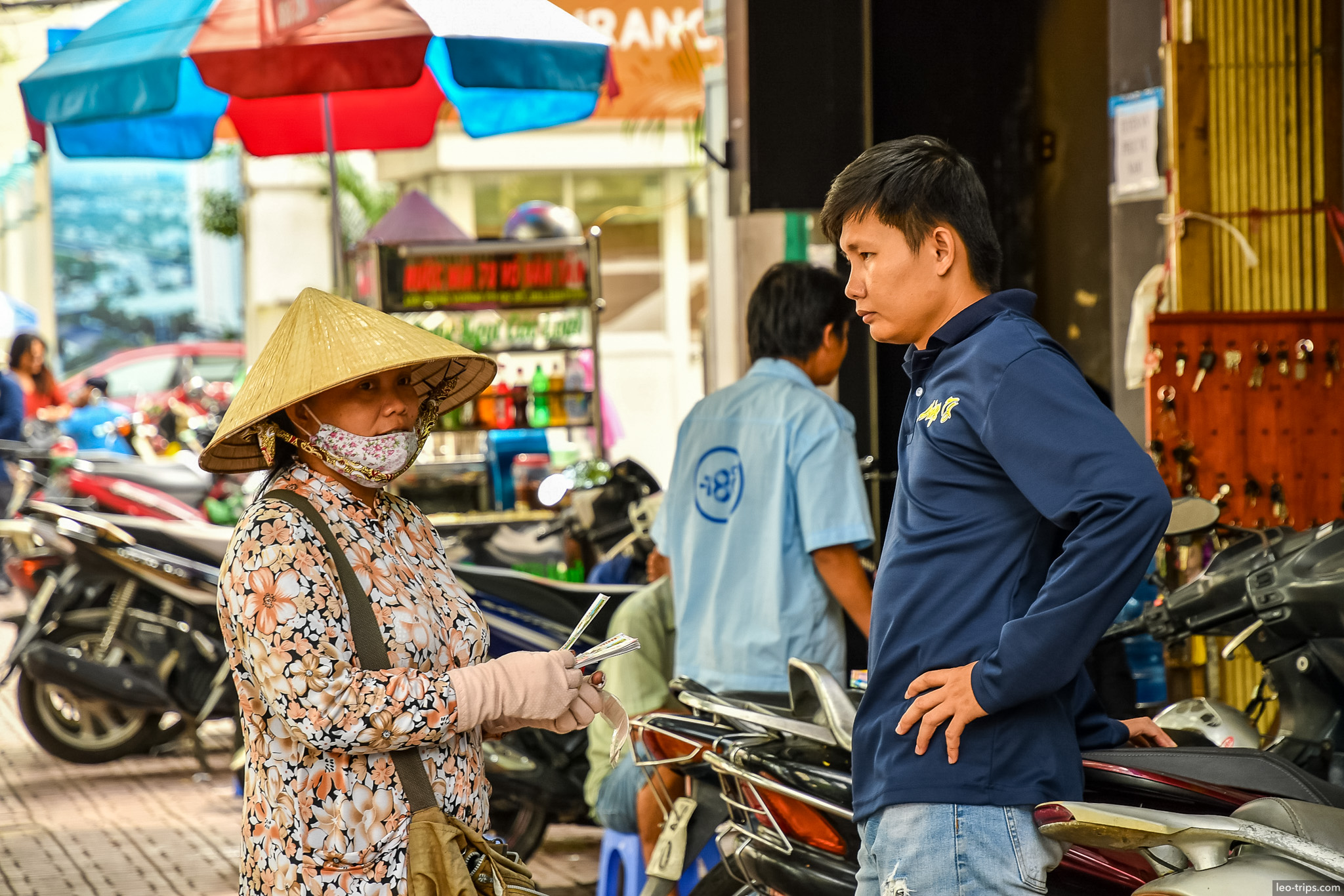 conical hat woman selling lottery tickets ho chi minh city