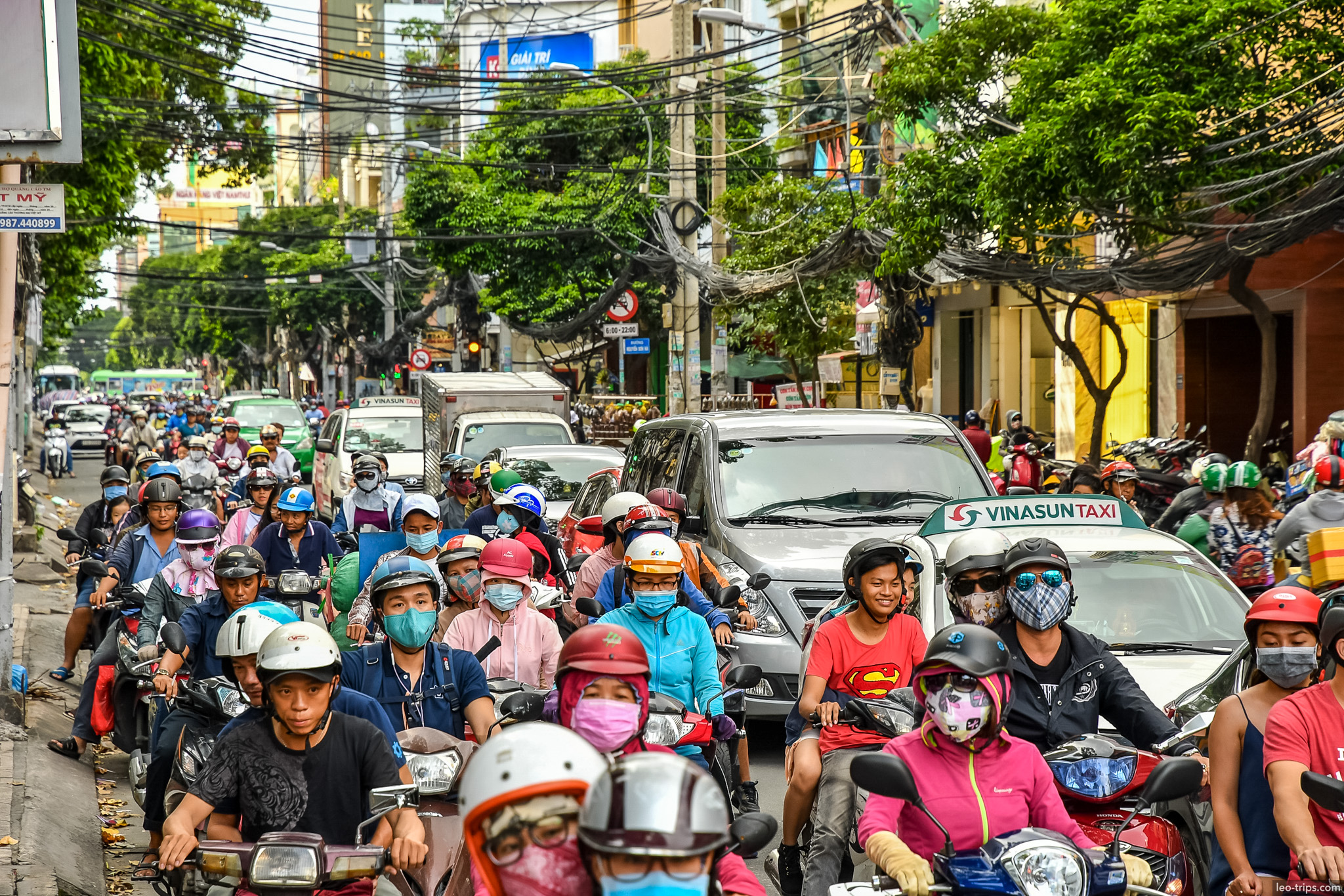motorbikes vinasun taxi traffic jam saigon ho chi minh city
