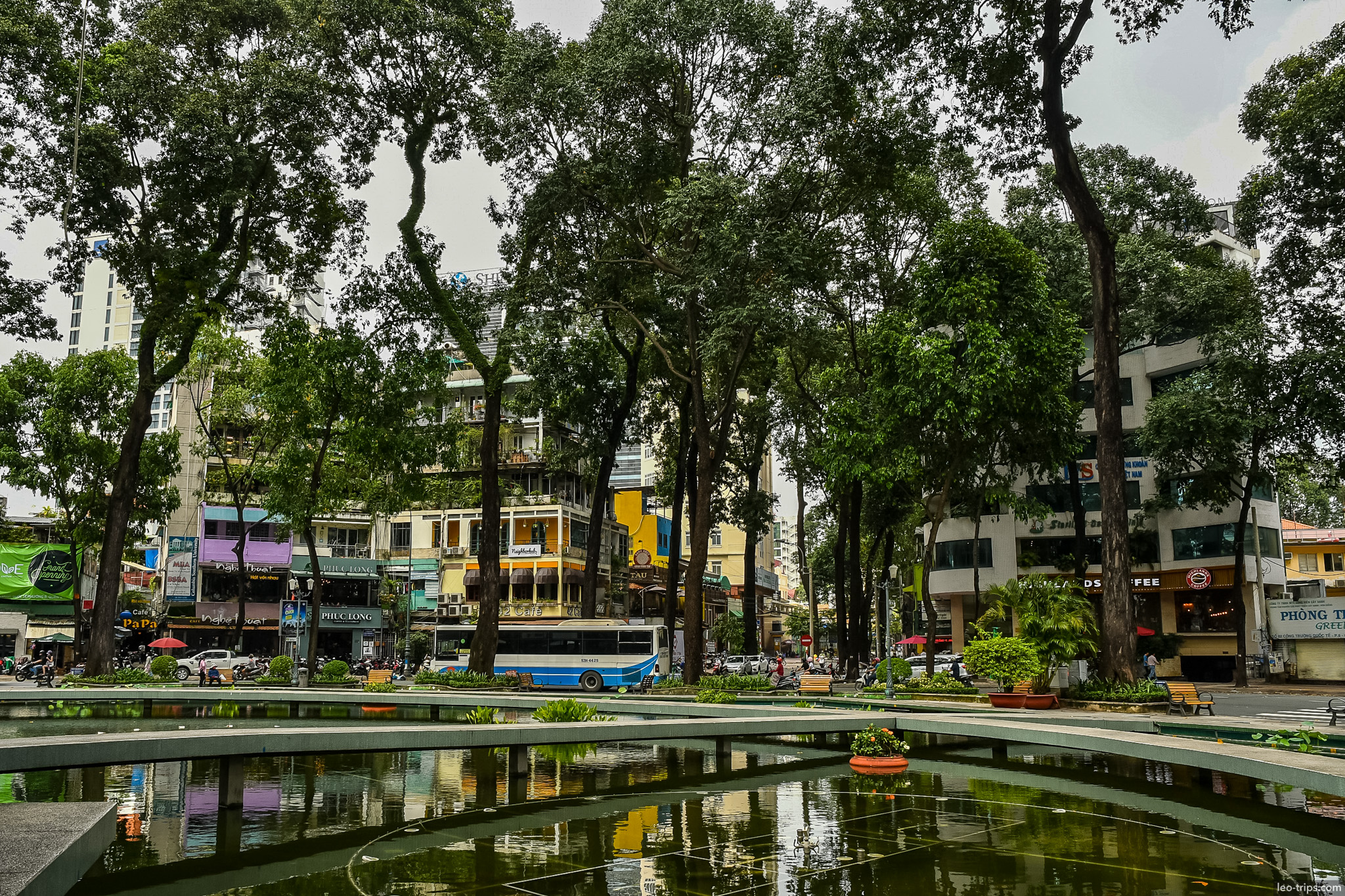 park fountain reflection trees district 1 ho chi minh city