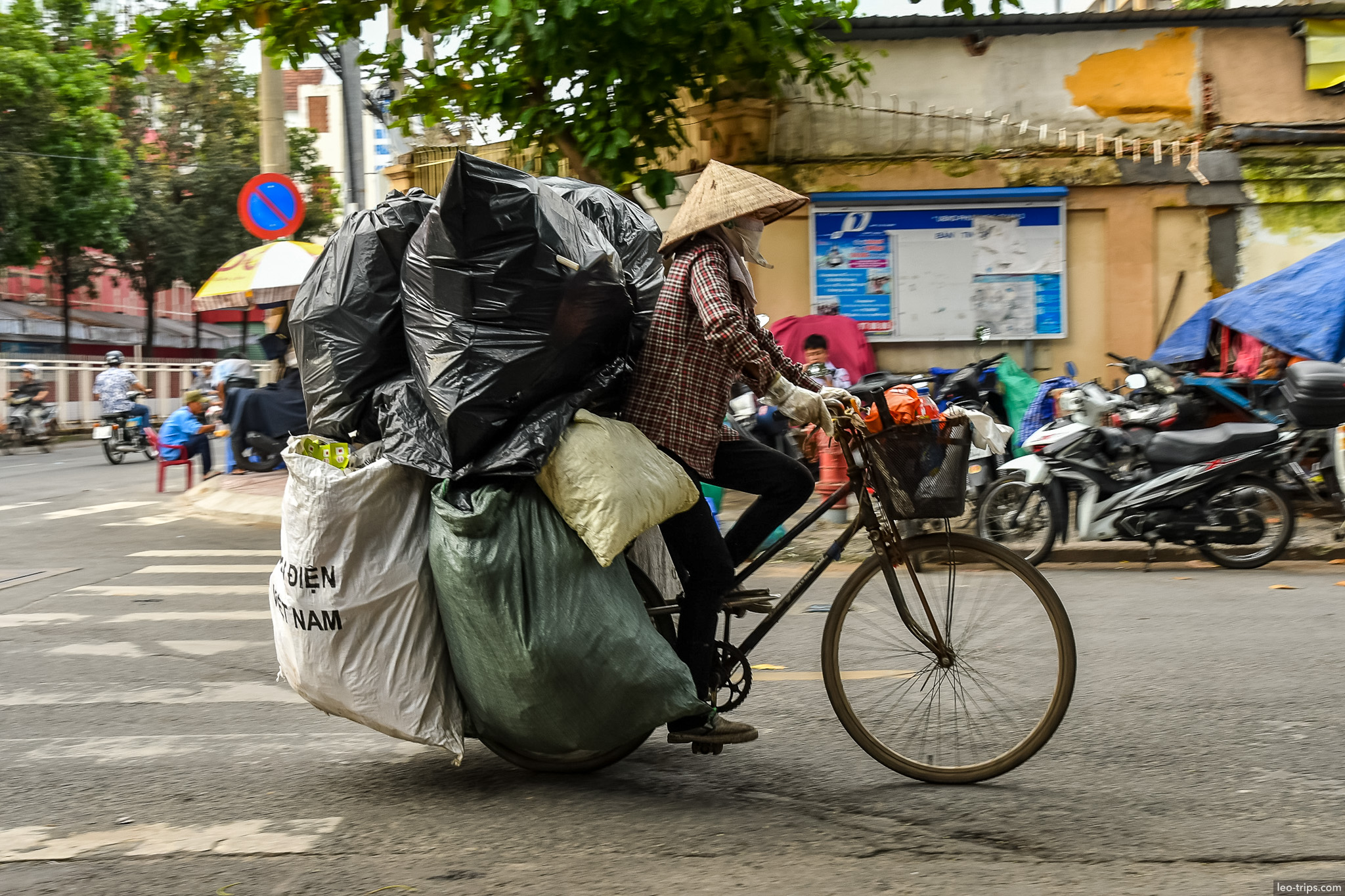 recycling collector overloaded bicycle saigon ho chi minh city