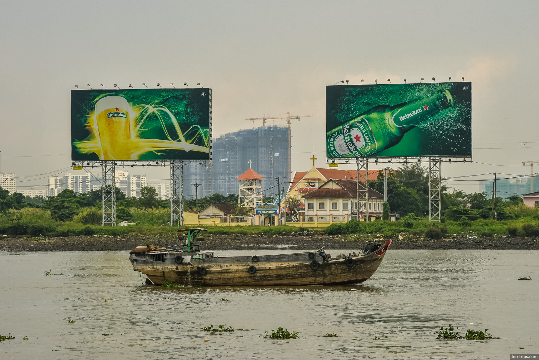 saigon river boat billboards church ho chi minh city