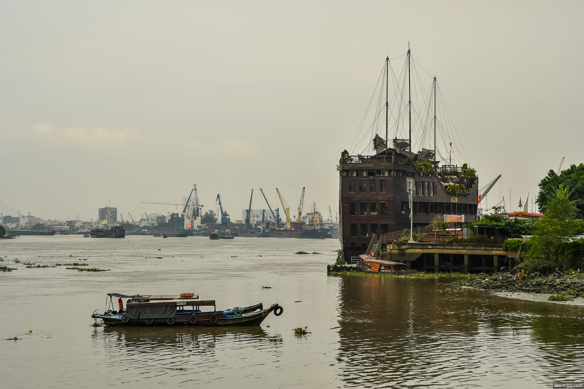 saigon river old ship restaurant port cranes ho chi minh city