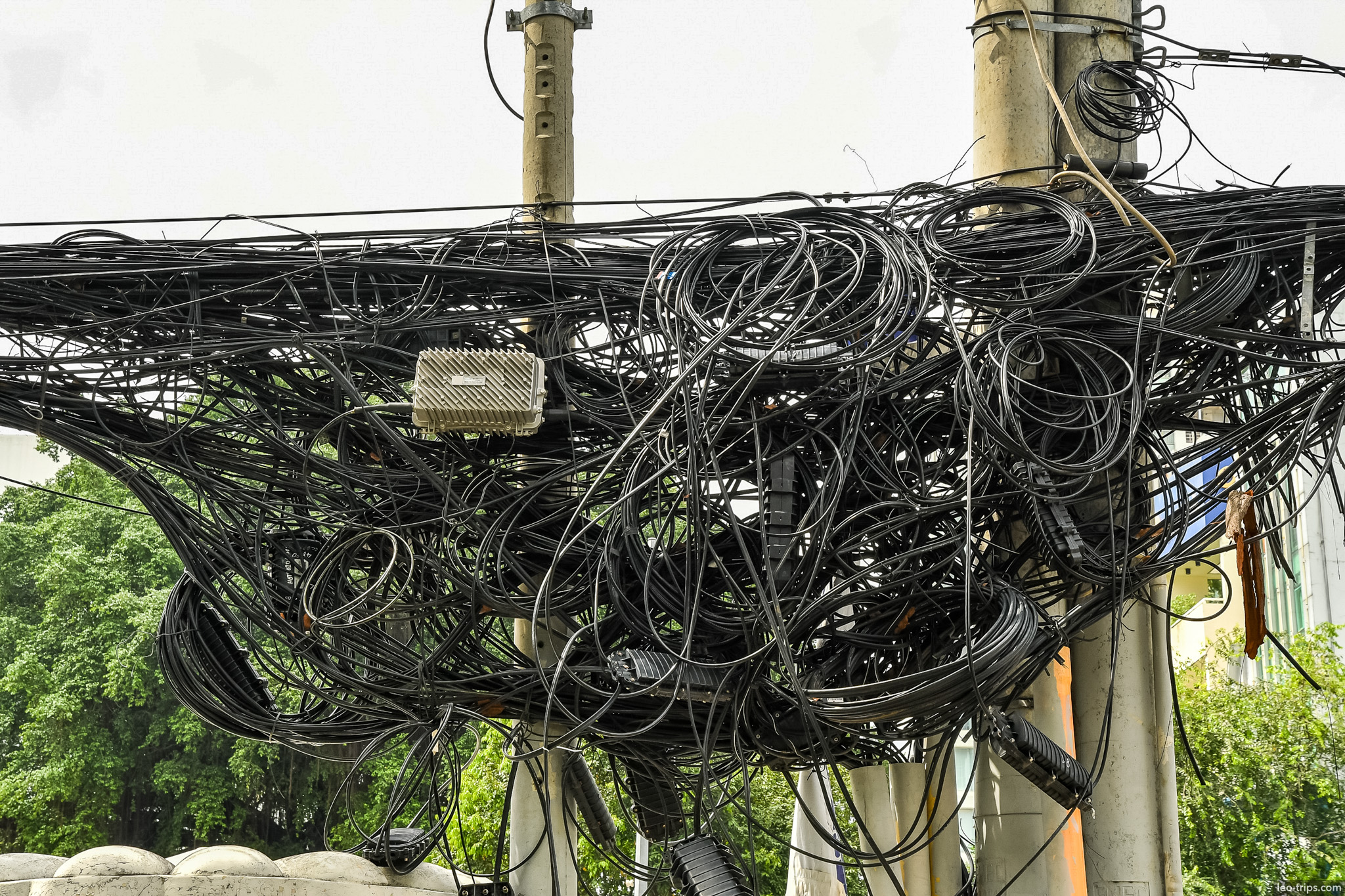tangled electric wires on pole saigon ho chi minh city