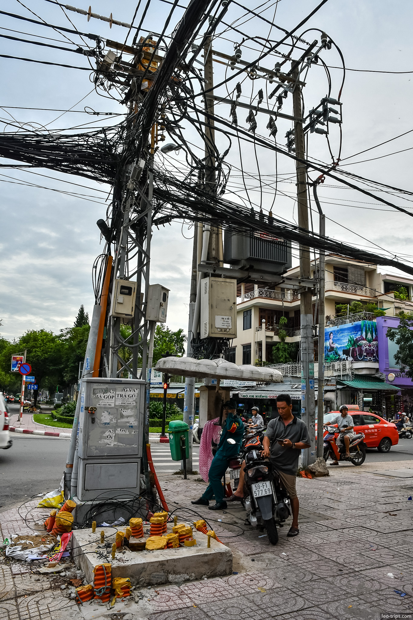 tangled power lines utility pole saigon street ho chi minh city