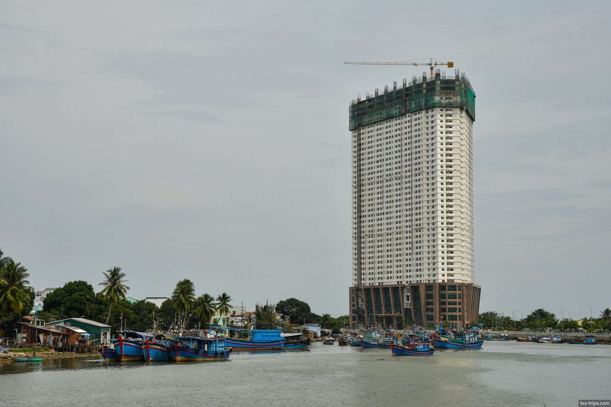 blue fishing boats vietnamese flag cai river nha trang