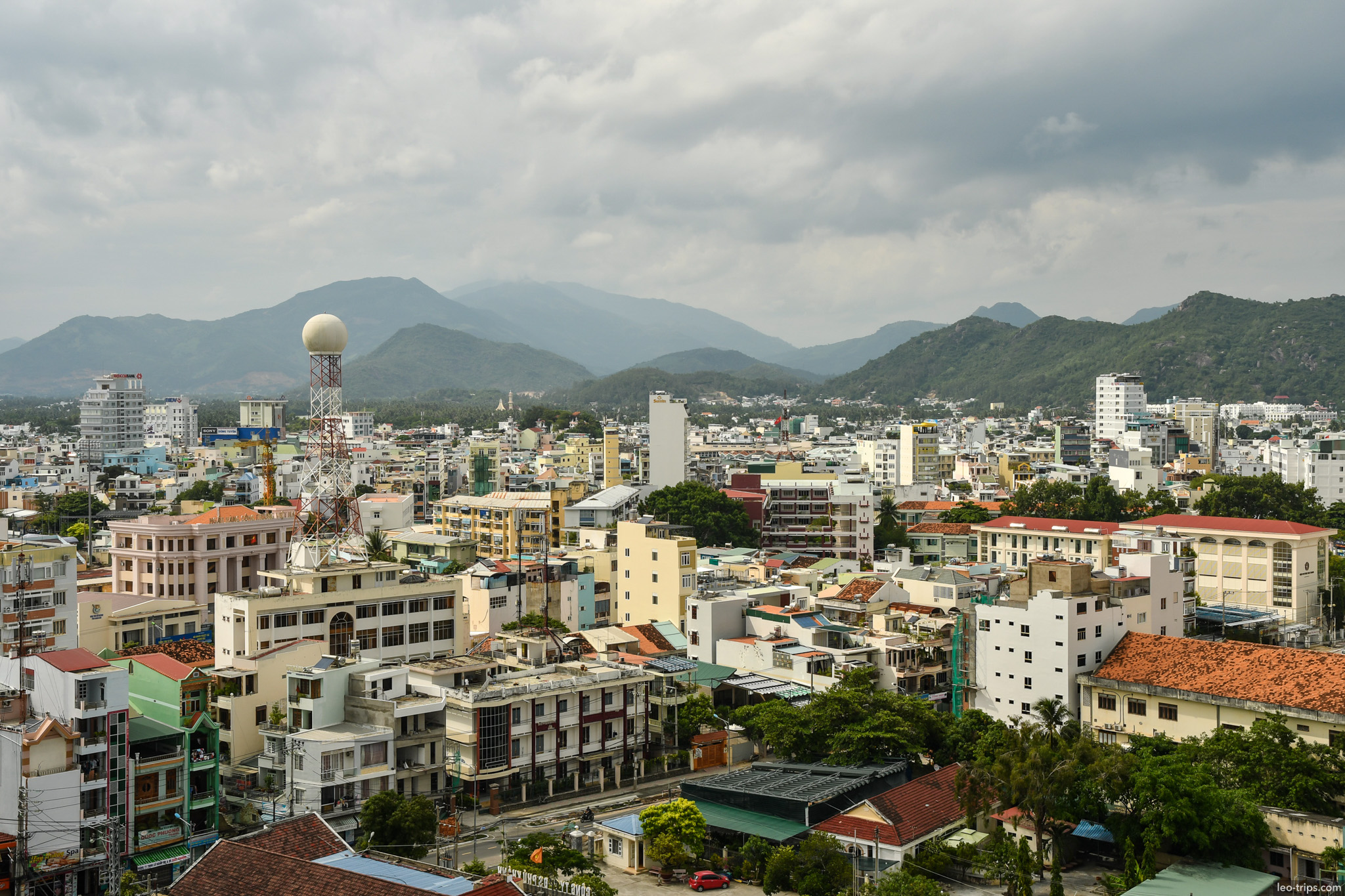 tree lined sidewalk brick fence nha trang boulevard nha trang